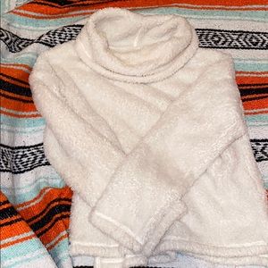 Loose turtleneck fuzzy sweater